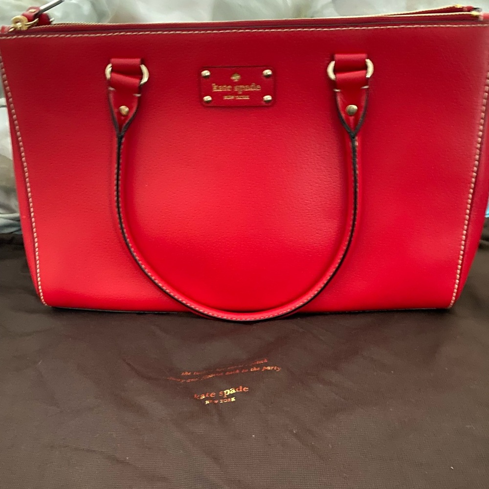 KATE SPADE red shoulder bag.